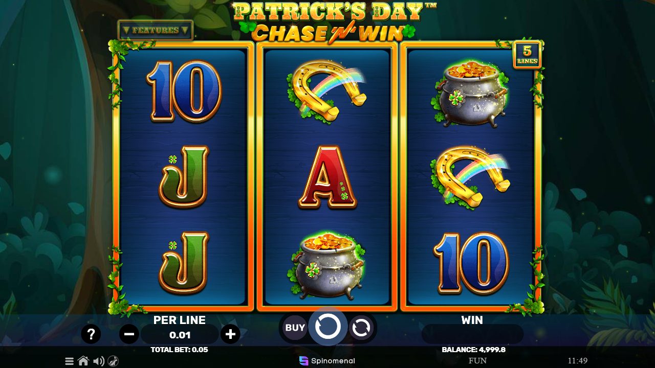 La grille à trois rouleaux et cinq lignes : fers à cheval arc-en-ciel, pots d'or et cartes 10/J/A, avec le bouton BUY pour forcer la poursuite.